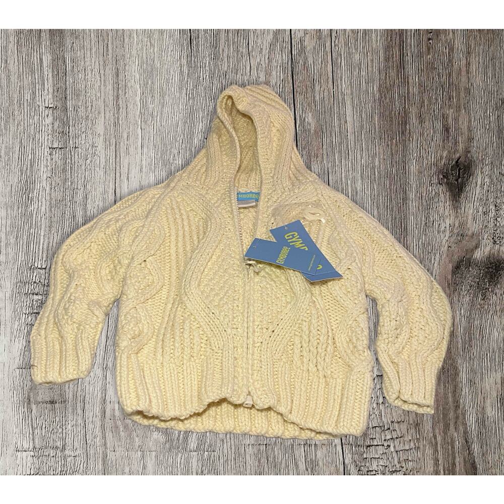 Gymboree cable knit baby’s sweater. 6-12 months. Color is cream